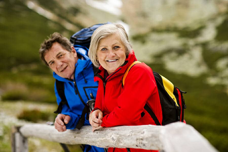 bigstock Senior couple hiking 67058629